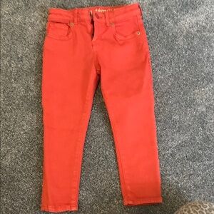 Girls red cropped skinny jeans. Size 5. Excellent condition.